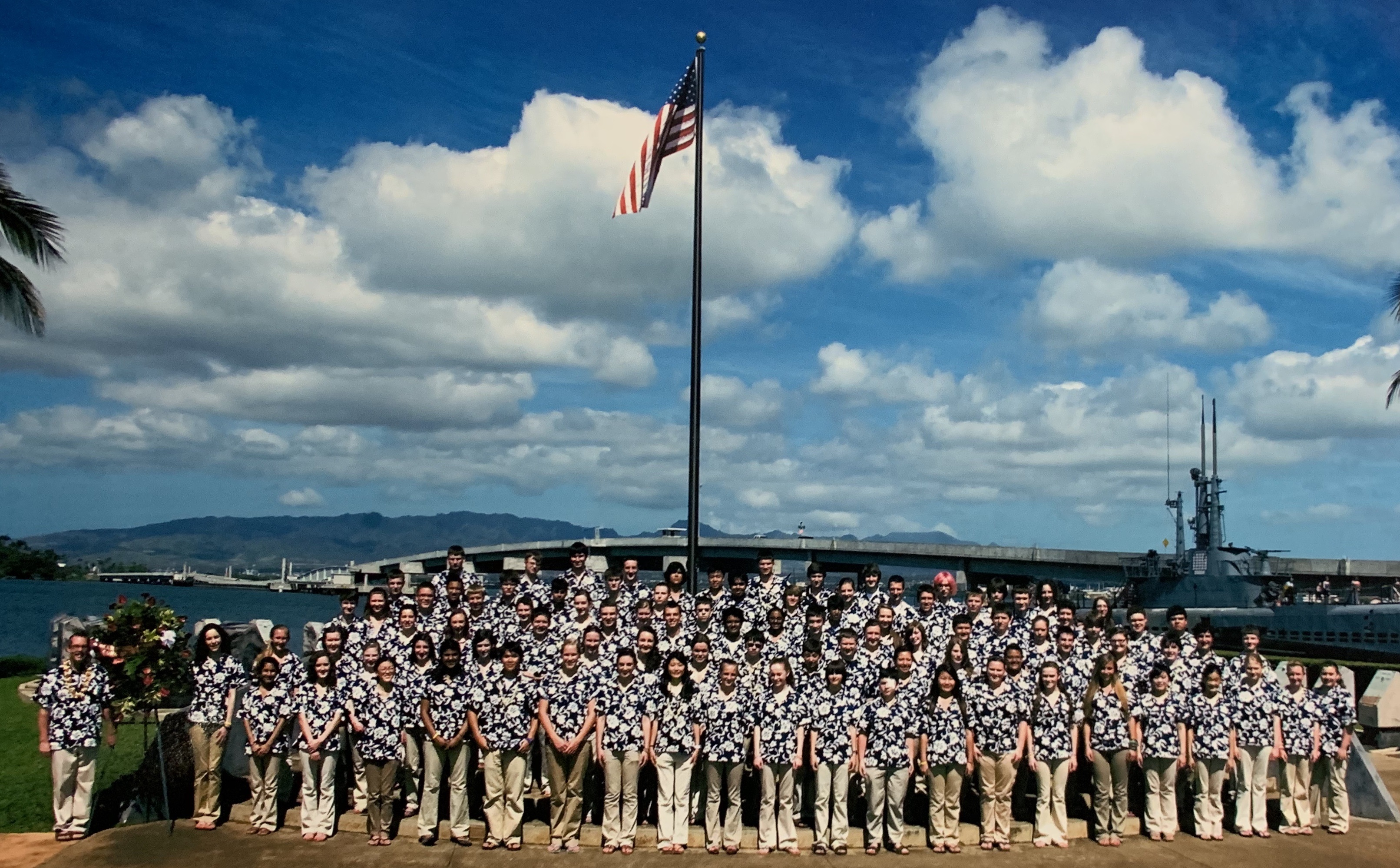 Okemosh High School band wearing HST Hawaiian shirts performs at Pearl Harbor in Hawaii