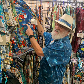 Senior gentleman shopping Hawaiian Shirts at the High Seas Trading booth at the Del Mar Fair