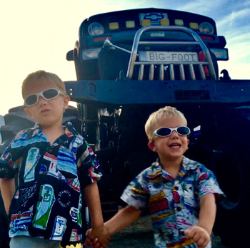 Kids Hawaiian Shirts in front of the Big Foot monster truck